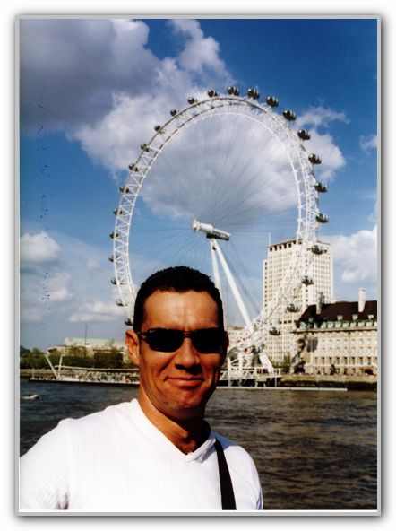 CJ on Thames River Cruise in front of London Eyel UK